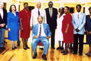 Governor General, Sir Howard Felix Hanlan Cooke (fifth from left), with Baha'i representatives.