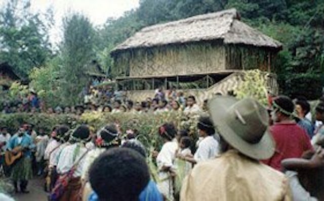 Welcome ceremony outside the new Baha'i Center in Kiniving.
