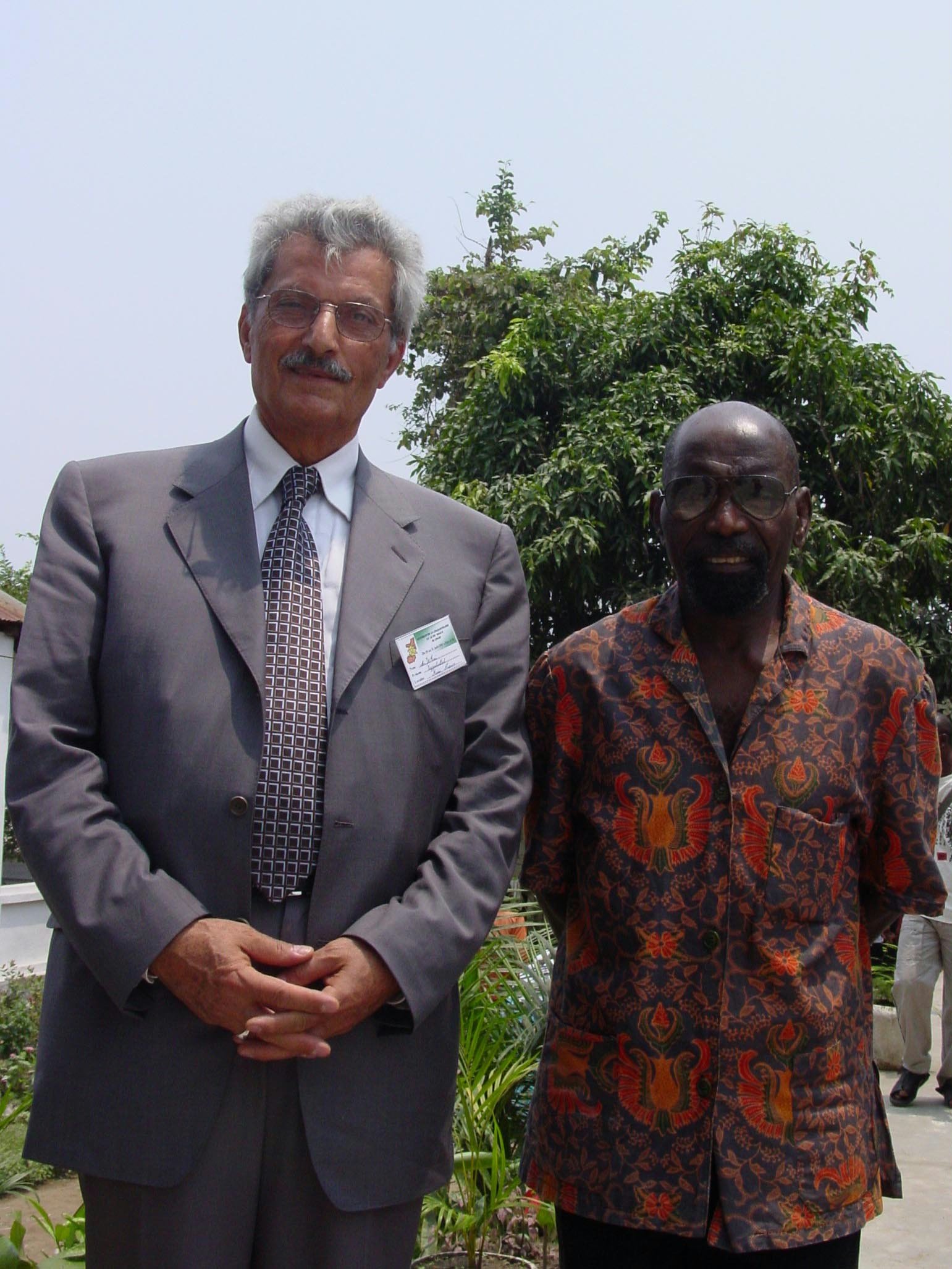 A founding member of the Congolese Baha'i community, Francois M'Bemba (right)and Dr. Ezzatullah Tai, a guest of honor.