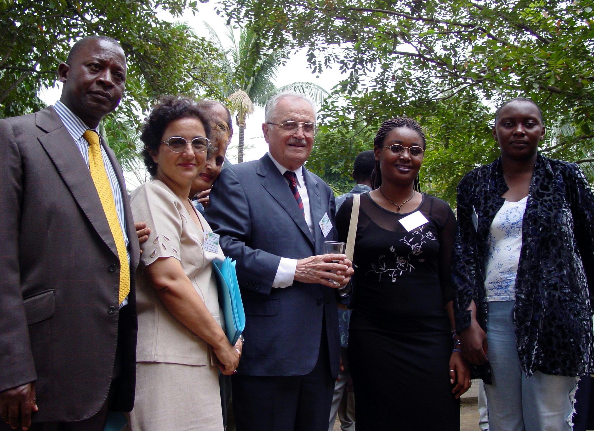 (From left to right): National Spiritual Assembly members, Ruffin Kinzuku (Chairman) and Mina Rameschfar, guest of honor Mr. Ali Nakhjavani, and two local Baha'is.