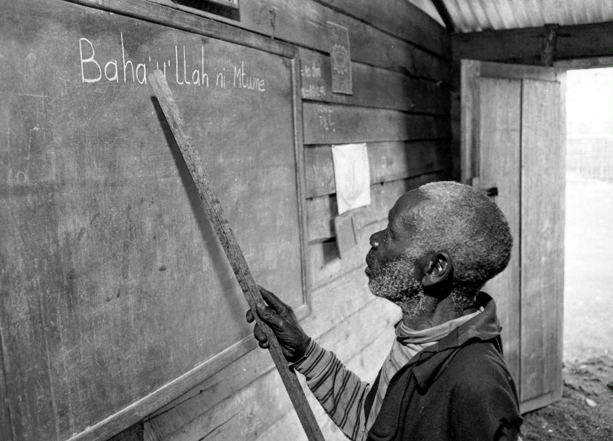 Member of Baha'i adult literacy class, Pygmy development project. Mubambiro, North Kivu, 1989. (Photo by Glen Egli.)