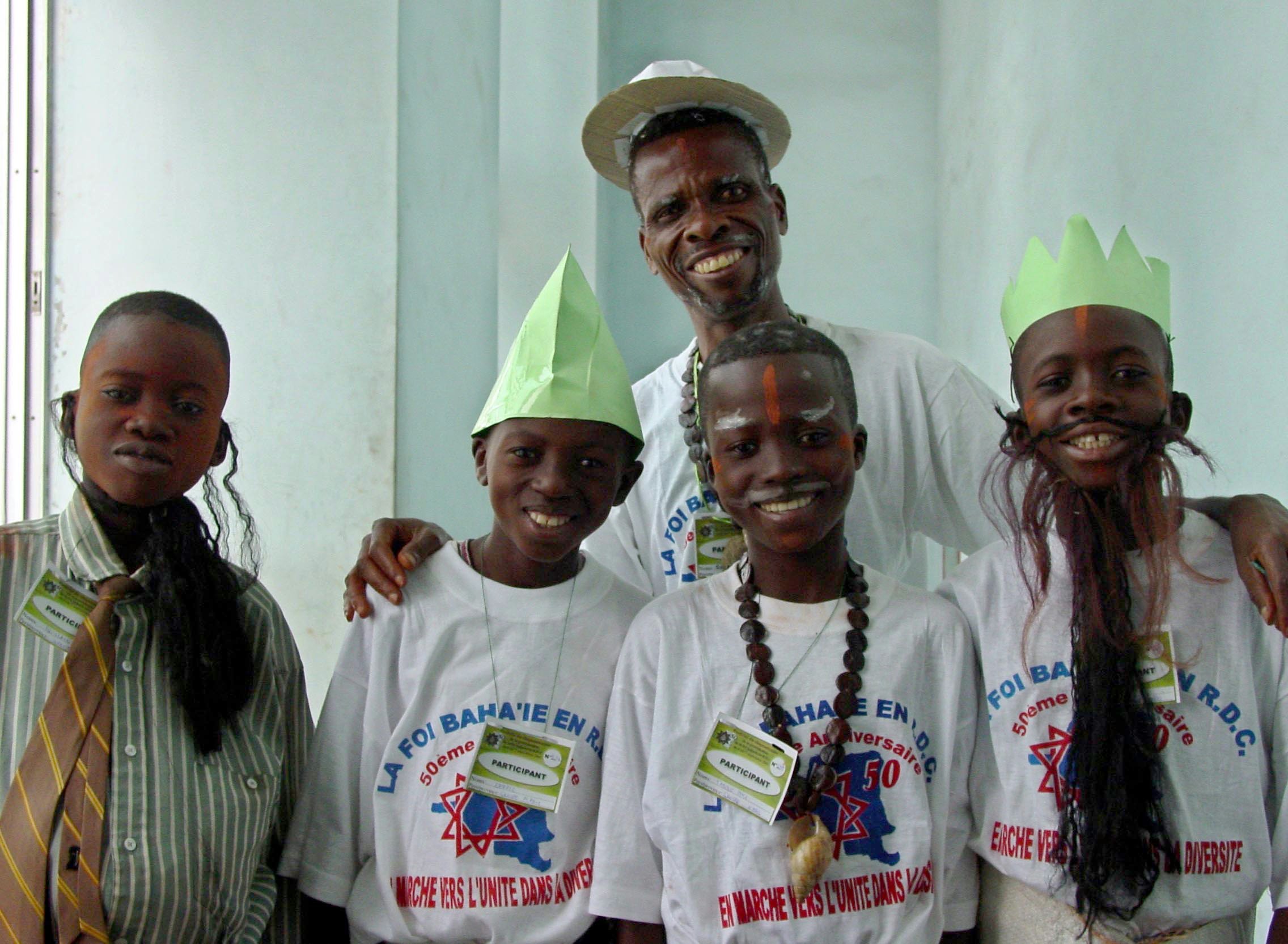 Nabil Children's Theatre depicting a travel teaching trip by Mr. Nakhjavani to the Belgian Congo. The actor at left played the lead role to Mr. Nakhjavani's amusement.