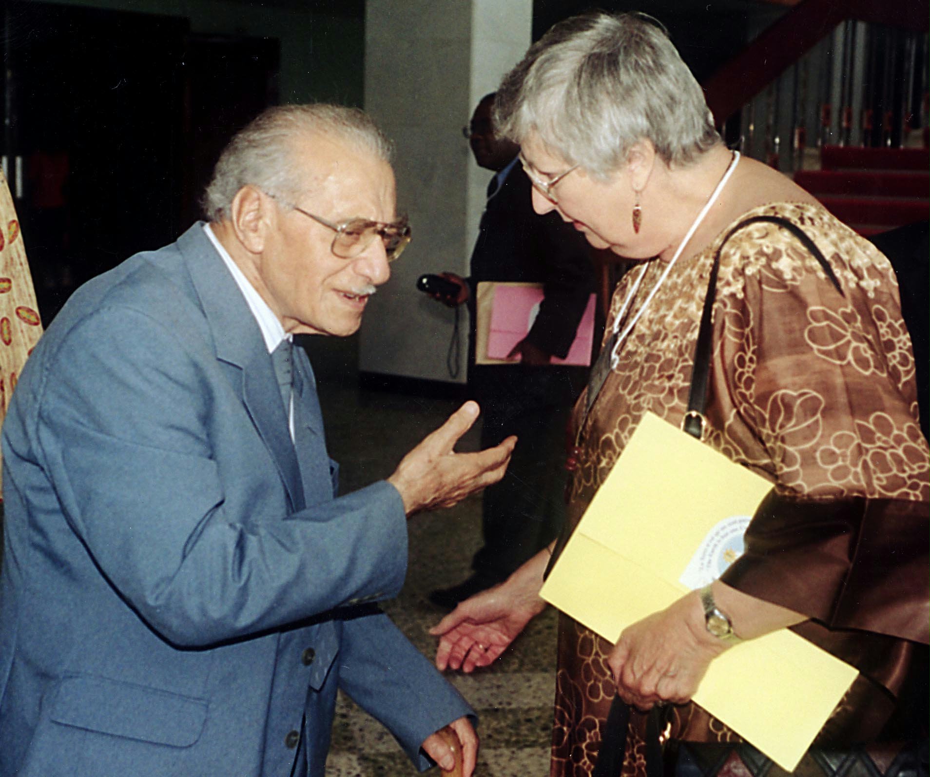 Mihdi Samandari and Janet Mughrabi, first secretary of the National Spiritual Assembly, meeting at the jubilee.