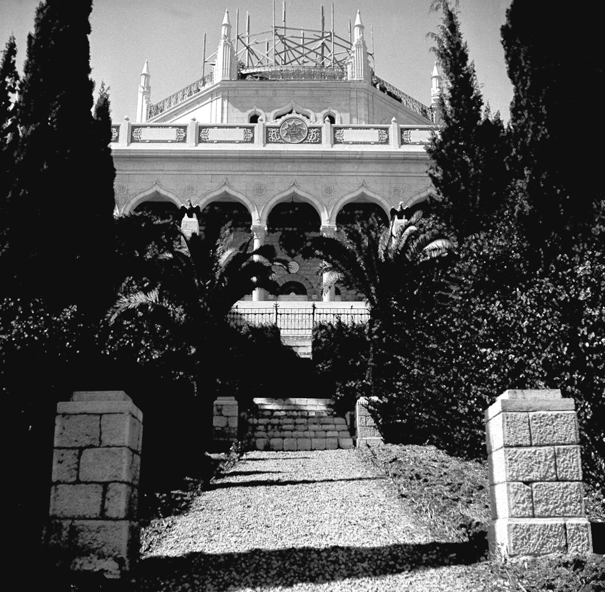 A view of the Shrine of the Bab while the drum was under construction, from a terrace below, 1952.