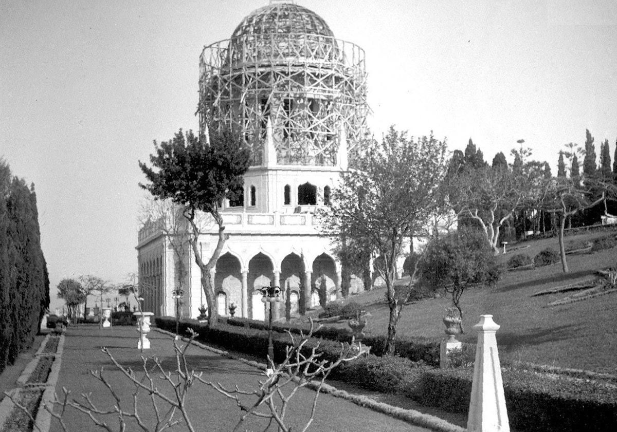 The dome and drum of the Shrine of the Bab take shape over the completed octagon and colonnade, 1952.