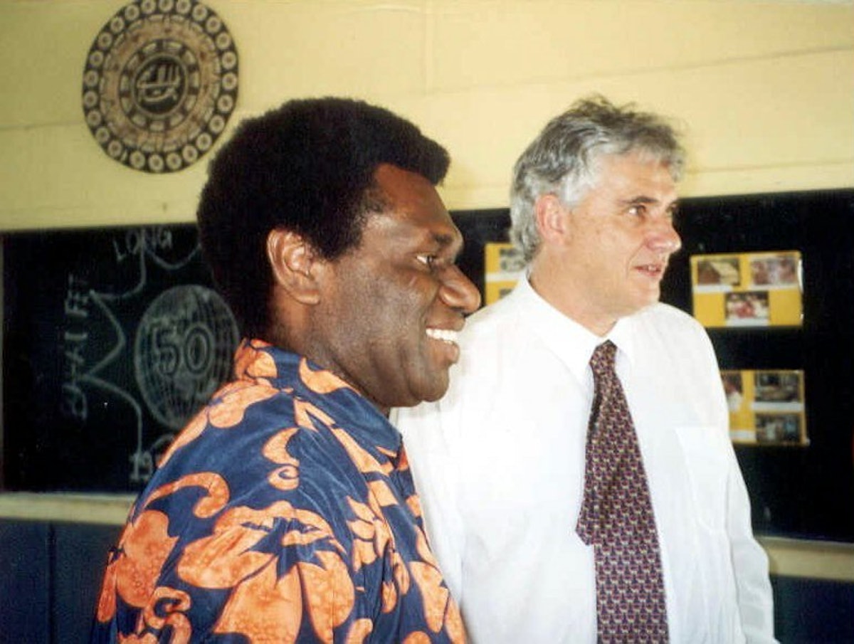 Sam Nasse, a member of the National Spiritual Assembly and the master of ceremonies for the jubilee meetings, with Stephen Hall, a member of the Continental Board of Counsellors.