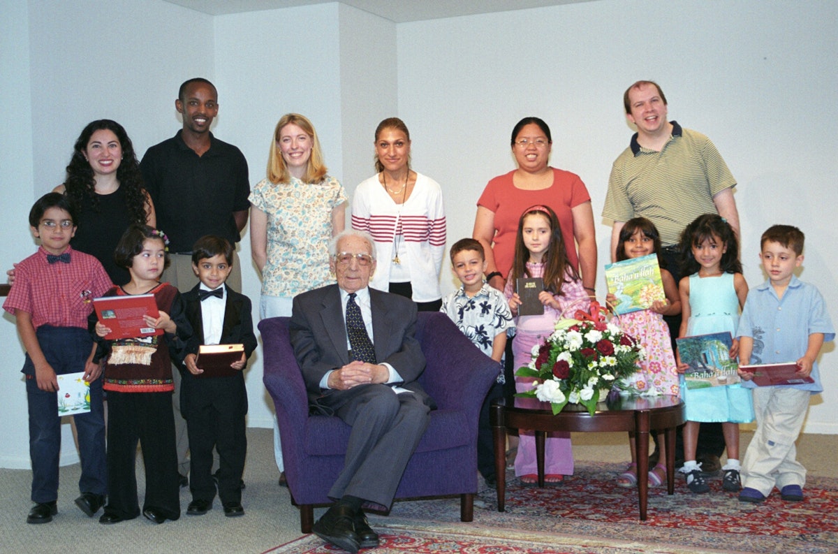 Mr. Furutan with Baha'i children and their teachers, June 2003.