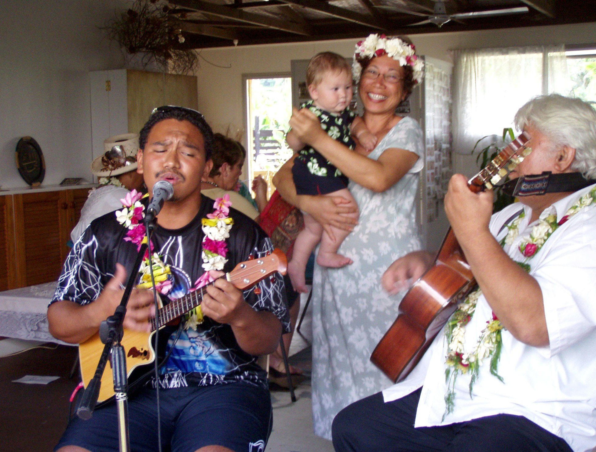 Musical celebrations... (Left to right) Kuhio Rosa-Travis, Mona Matepi holding Akiva Griffin, Papa Teata Makirere.