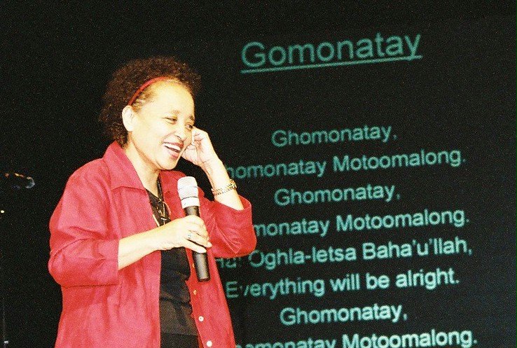Rebequa Murphy teaches a South African song to the conference participants.