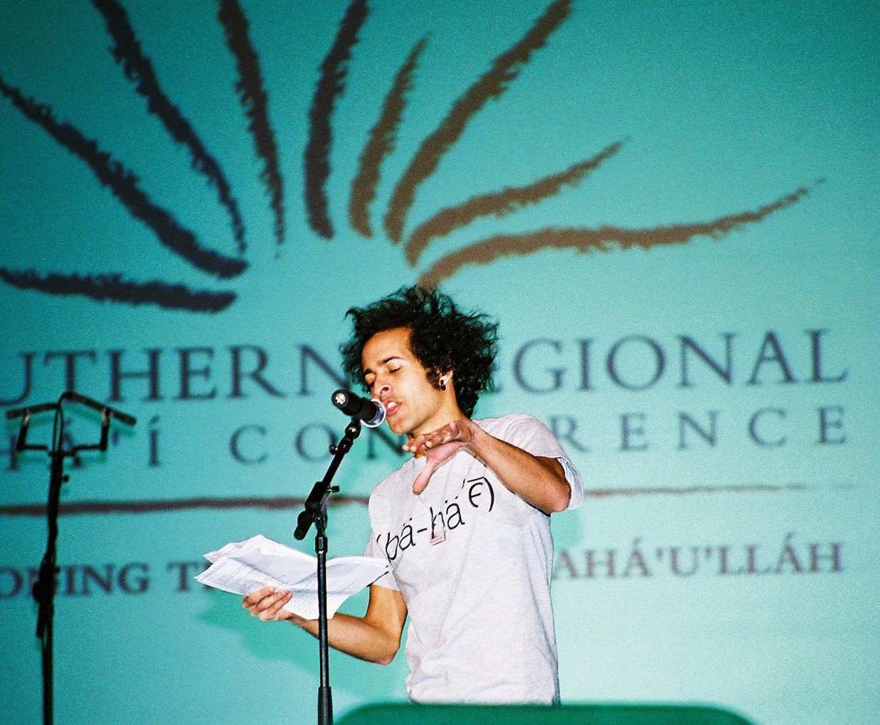 Poetic inspiration...Anis Mojgani recites one of his poems at the conference in Nashville. Photo by Tom Mennillo.