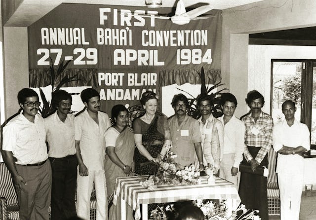 The first Spiritual Assembly of Andaman and Nicobar Islands with, at center, Madame Ruhiyyih Rabbani, a Hand of the Cause, and the widow of Shoghi Effendi.