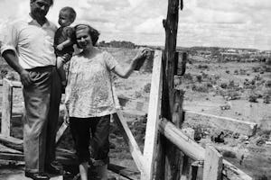 Mr. and Mrs. Hainsworth with their son, Richard, at the top of the Baha'i House of Worship in Kampala, Uganda, shorthly before it was completed in 1961. Mr. Hainsworth was one of the six Baha'is who founded the Baha'i community in Uganda in 1951.