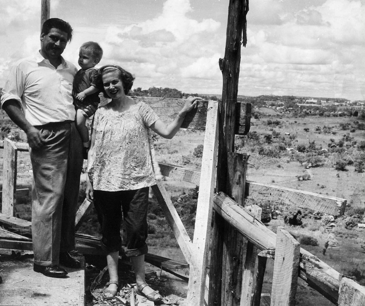 Mr. and Mrs. Hainsworth with their son, Richard, at the top of the Baha'i House of Worship in Kampala, Uganda, shorthly before it was completed in 1961. Mr. Hainsworth was one of the six Baha'is who founded the Baha'i community in Uganda in 1951.