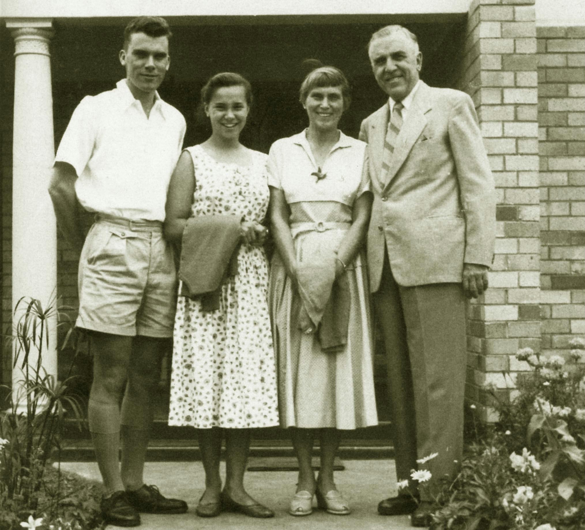 Hand of the Cause John Robarts (right) with his wife, Audrey, and children, Patrick (left) and Nina (second from left).