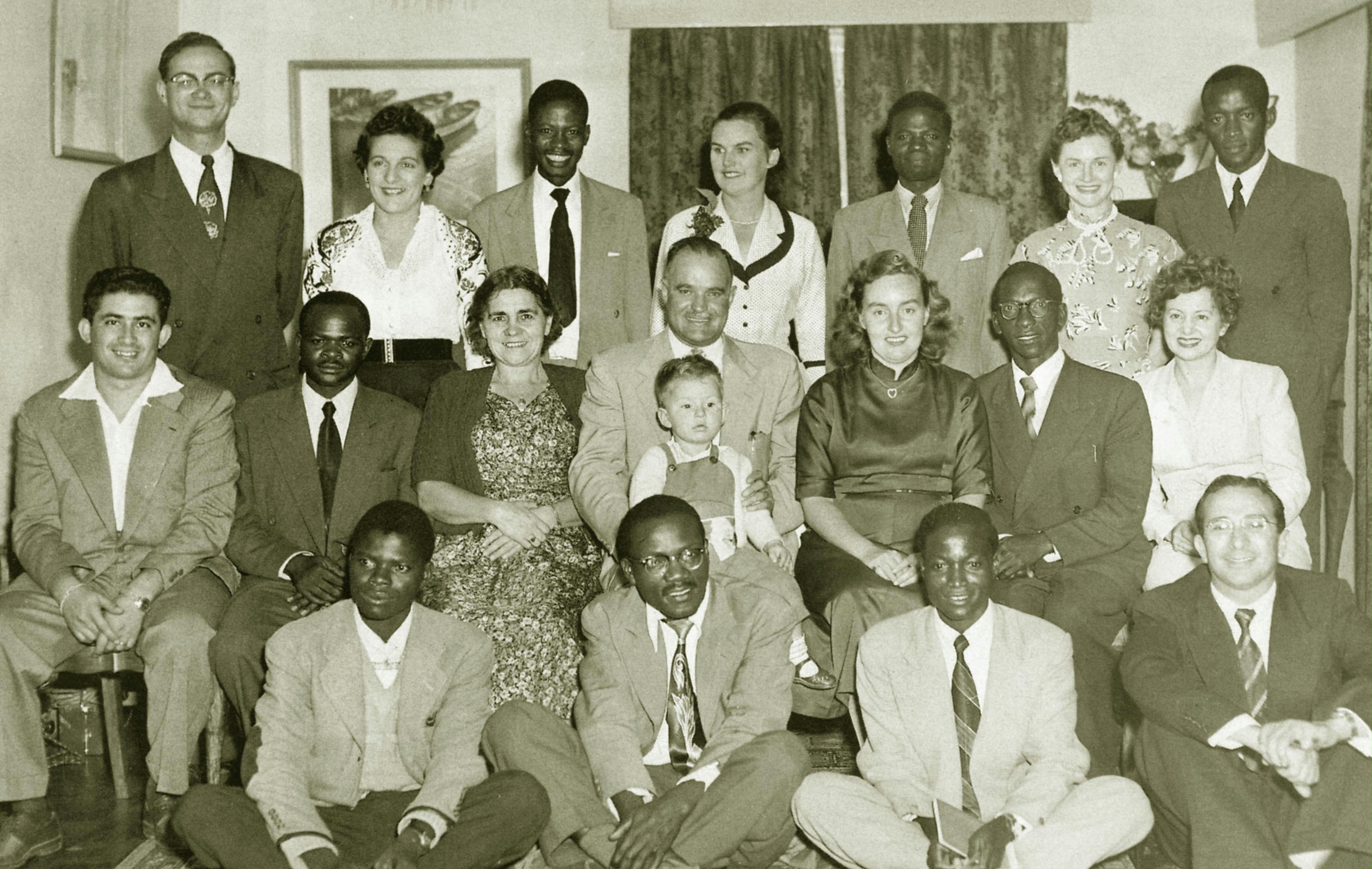 (Front, left to right) Charles Zauyamakando, Dundusa Chisiza, Bernard Toni, Salvator ("Sue") Benatar, (middle, left to right) Shidan Fat'he-Aazam, Willie Msarurwa, Claire Gung (Knight of Baha'u'llah), Larry Hautz with Denny Fat'he-Aazam, Helen Hope, Masten Mganhiri, Carol Hautz, (back, left to right) Melvin Hope, Sylvia Benatar, Isaac Kachuwendi, Joan Chalker, Moses Makwaya, Florence Fat'he-Aazam, Nathan Shamuyarira.