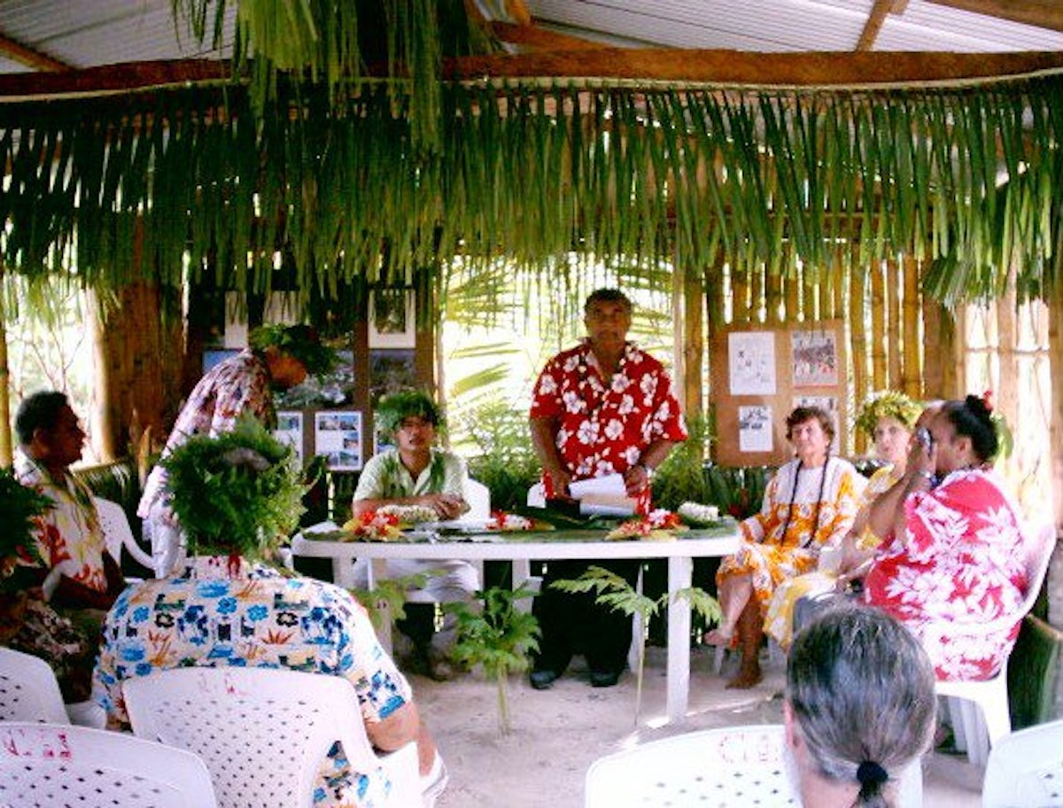 Hubert Bremond, chairman of the Local Siritual Assembly of Huahine, welcomes guests at the opening ceremony.
