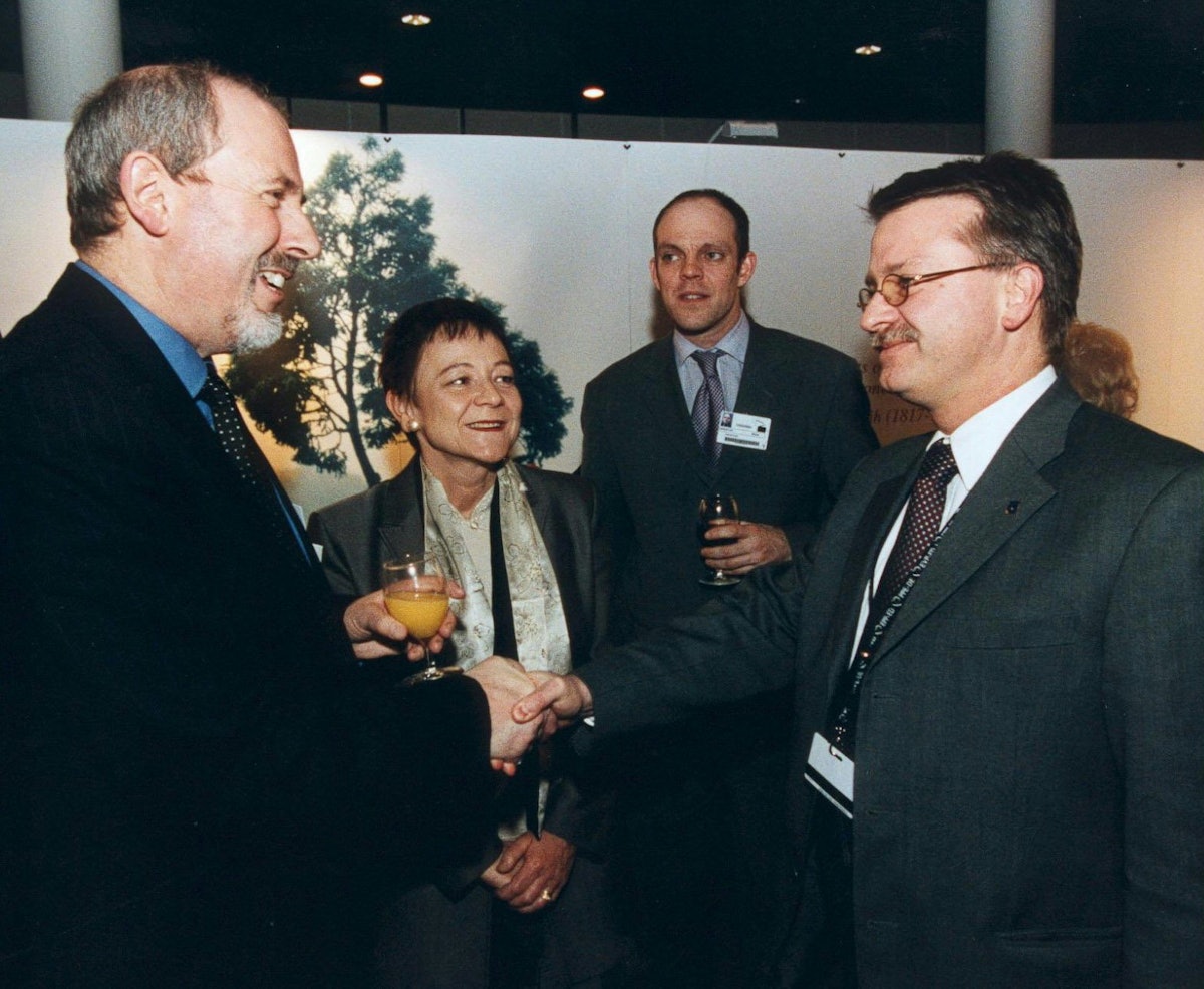 Baroness Ludford with Michael Gahler (right), a German member of the European Parliament, and Baha'i representatives Barney Leith (left) and Daniel Wheatley (second from right). Photo by European Parliament.