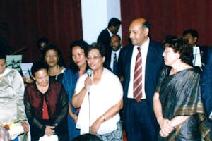 Official opening ceremony at the Hilton Madagascar... representatives of the four National Spiritual Assemblies (left to right): Randrianarivelo Roger Florentin (Madagascar), Olivia Faranirina (Madagascar), Jimmy Servina (Seychelles), Lila Andriambalo (Madagascar), Daisy Robert (Reunion), Lala Rakotoarivelo (Madagascar), Mialy Rasandratanarivo (Madagascar), Chantal Morille (Reunion) holding microphone, Parmanand Sanicharane (Mauritius), Homa Mungapen (Mauritius), Moutou Jose (Madagascar), Peggy Baichoo (Reunion).