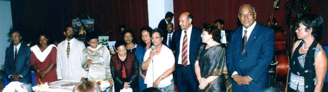 Official opening ceremony at the Hilton Madagascar... representatives of the four National Spiritual Assemblies (left to right): Randrianarivelo Roger Florentin (Madagascar), Olivia Faranirina (Madagascar), Jimmy Servina (Seychelles), Lila Andriambalo (Madagascar), Daisy Robert (Reunion), Lala Rakotoarivelo (Madagascar), Mialy Rasandratanarivo (Madagascar), Chantal Morille (Reunion) holding microphone, Parmanand Sanicharane (Mauritius), Homa Mungapen (Mauritius), Moutou Jose (Madagascar), Peggy Baichoo (Reunion).