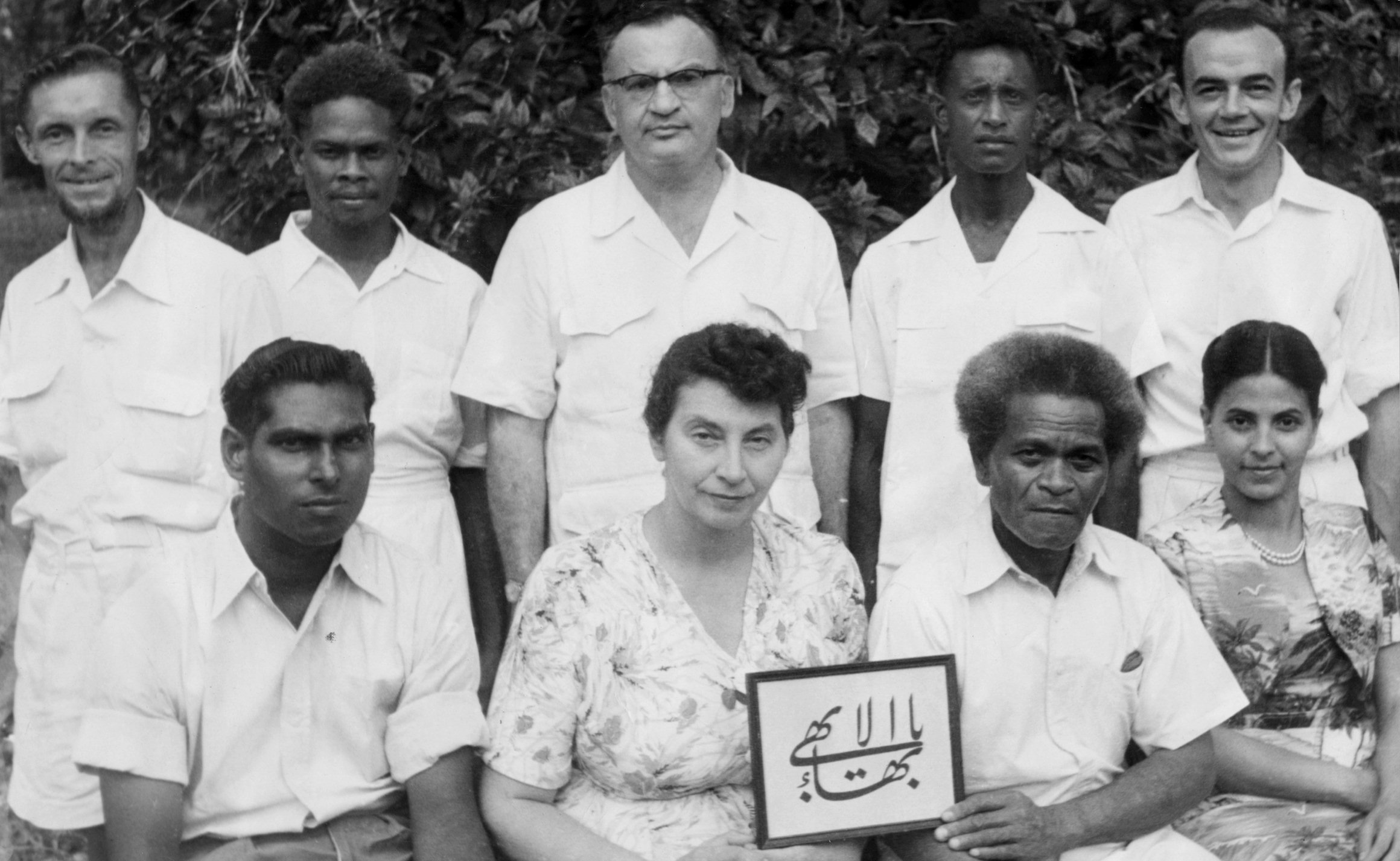 Alvin Blum (back row third from left) and Gertrude Blum (front row second from left) with other members of first Spiritual Assembly of the Baha'is of Honiara, 1957.