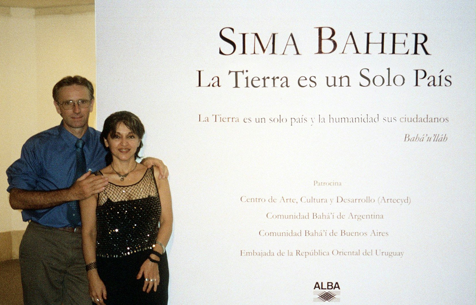 Sima Baher with her husband Alejandro Caballero, in front of the entrance to her exhibition in the Borges Cultural Center in Buenos Aires.