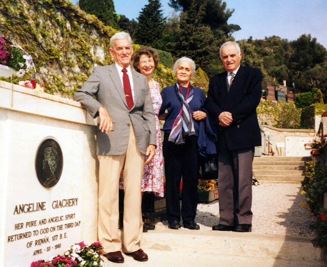 At the gravesite in Monte Carlo, Monaco, of Angeline Giachery, the wife of the Hand of the Cause Ugo Giachery. (Right to left) Mr. Ali Nakhjavani, Mrs. Violette Nakhjavani, Mrs. Florence Kelley, Mr. Larry Kelley. Photo courtesy of Hawai'i Baha'i News.