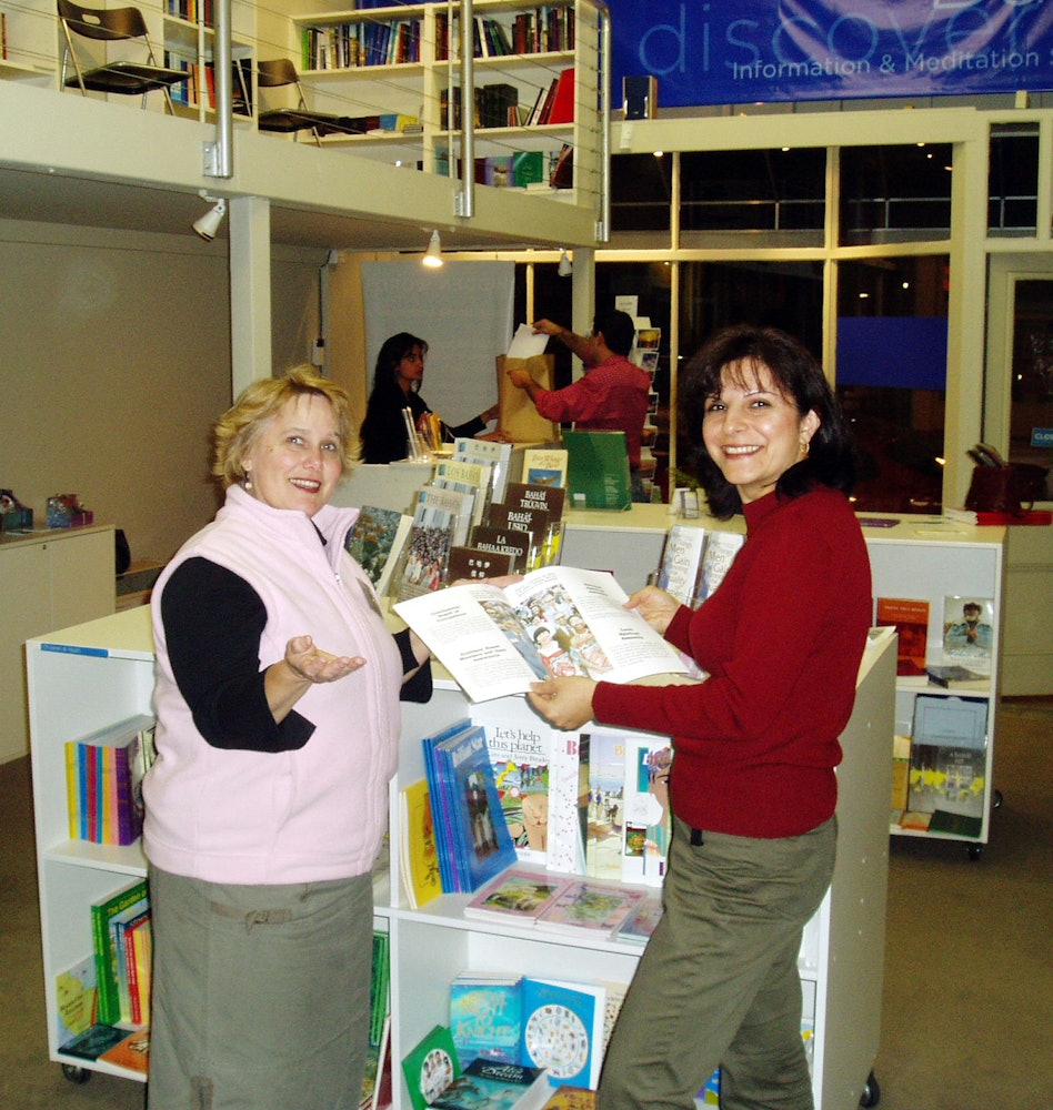 Inside the bookshop...volunteers Betsy Dere (left) and Emilia Tabrizi.