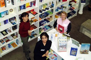 Volunteer staff (left to right) Emilia Tabrizi, Jaklin Rashidi, Betsy Dere.