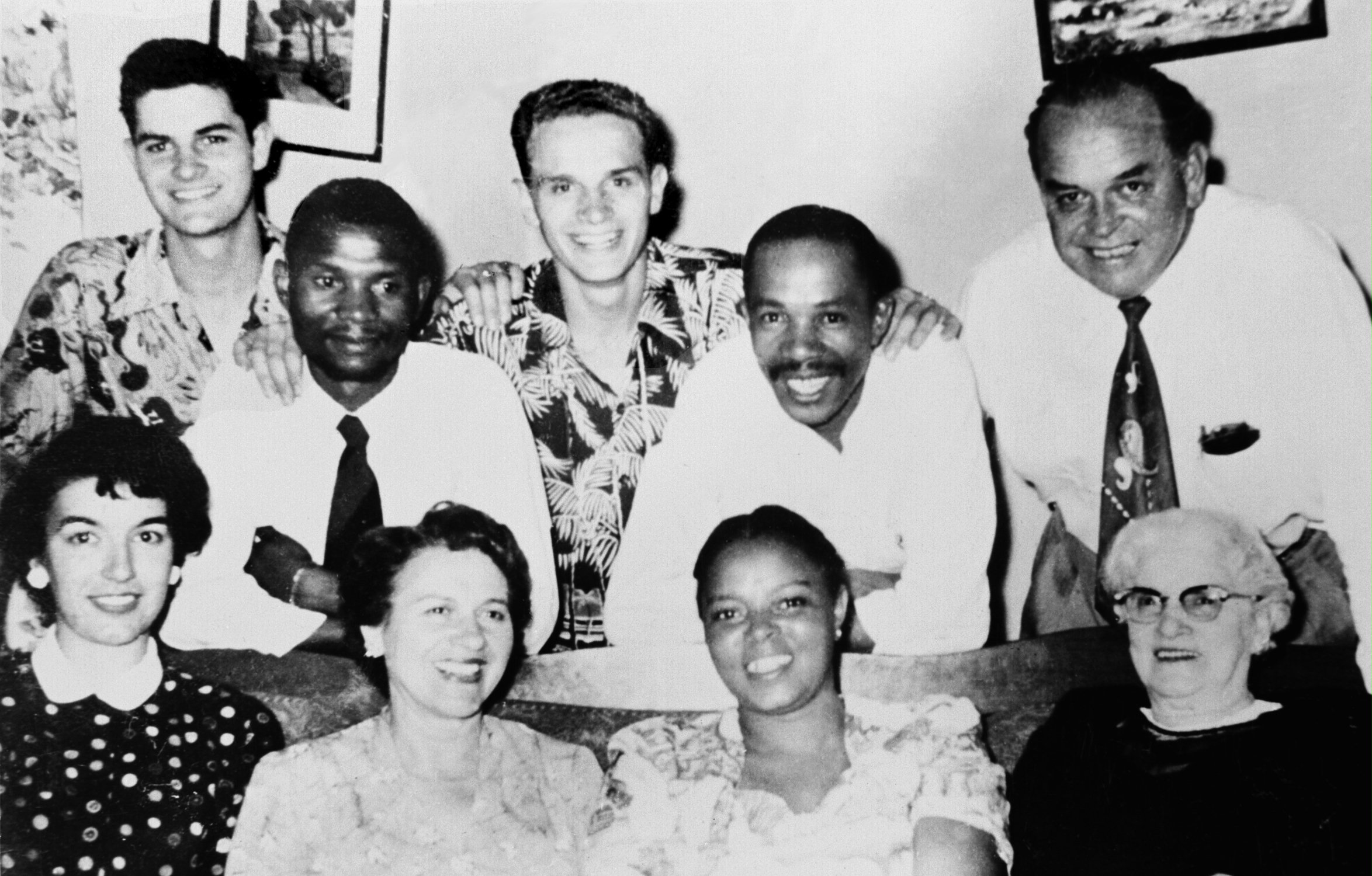 Early Baha'is of Swaziland, 19 November, 1954: (front, left to right) Margot Bosch, Valera Allen, Jemima Phala, Maude Fisher. (Middle, left to right) Maxwell Ndlovu, Isaiah Phala. (Back, left to right) Dale Allen, Kenton Allen, John Allen.
