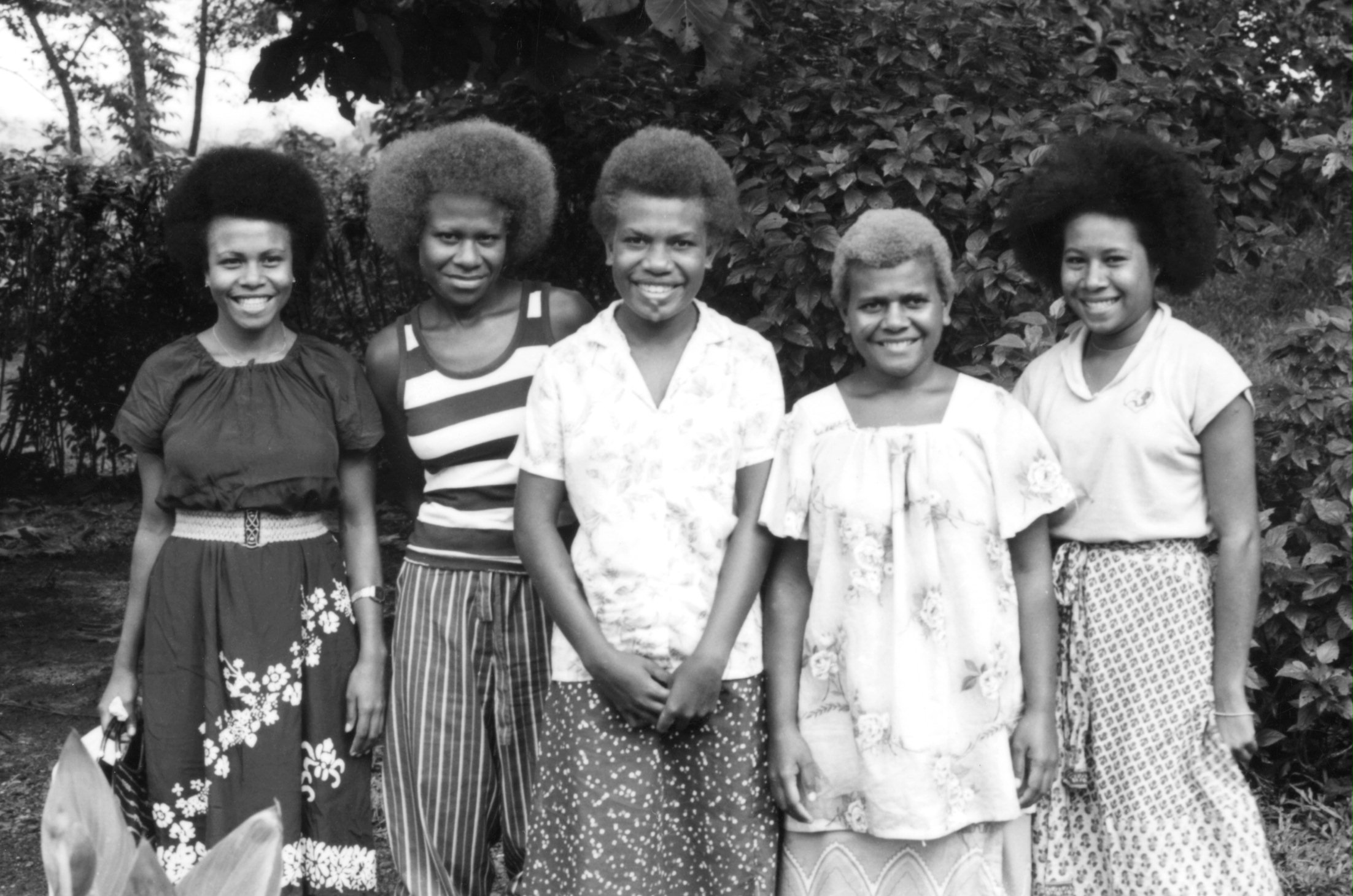 First local all-girl Baha'i teaching team in Papua New Guinea. (Left to right) Jenny Homerang (New Ireland), Thelma Lundeng (New Ireland), Rose Elias (New Ireland), Lingling Hosea (Kimbe), and Poigo Willie (Kimbe). July 1982.
