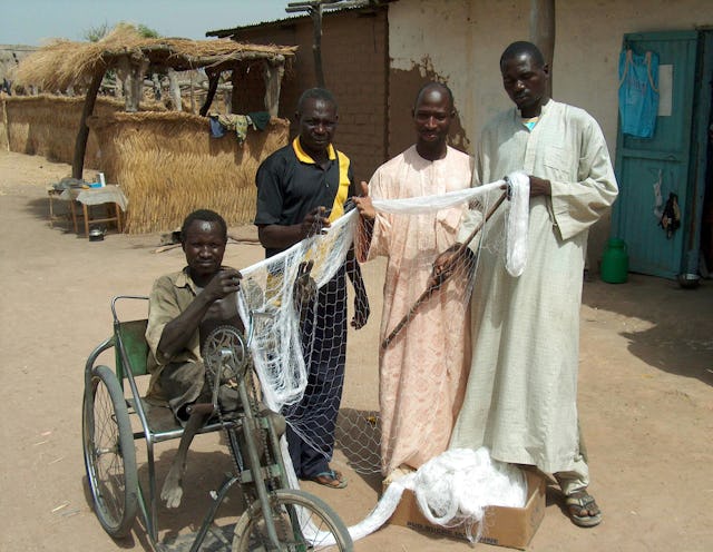 Netmaker Ali Mahamat (third from left) with fishermen from Waltama.