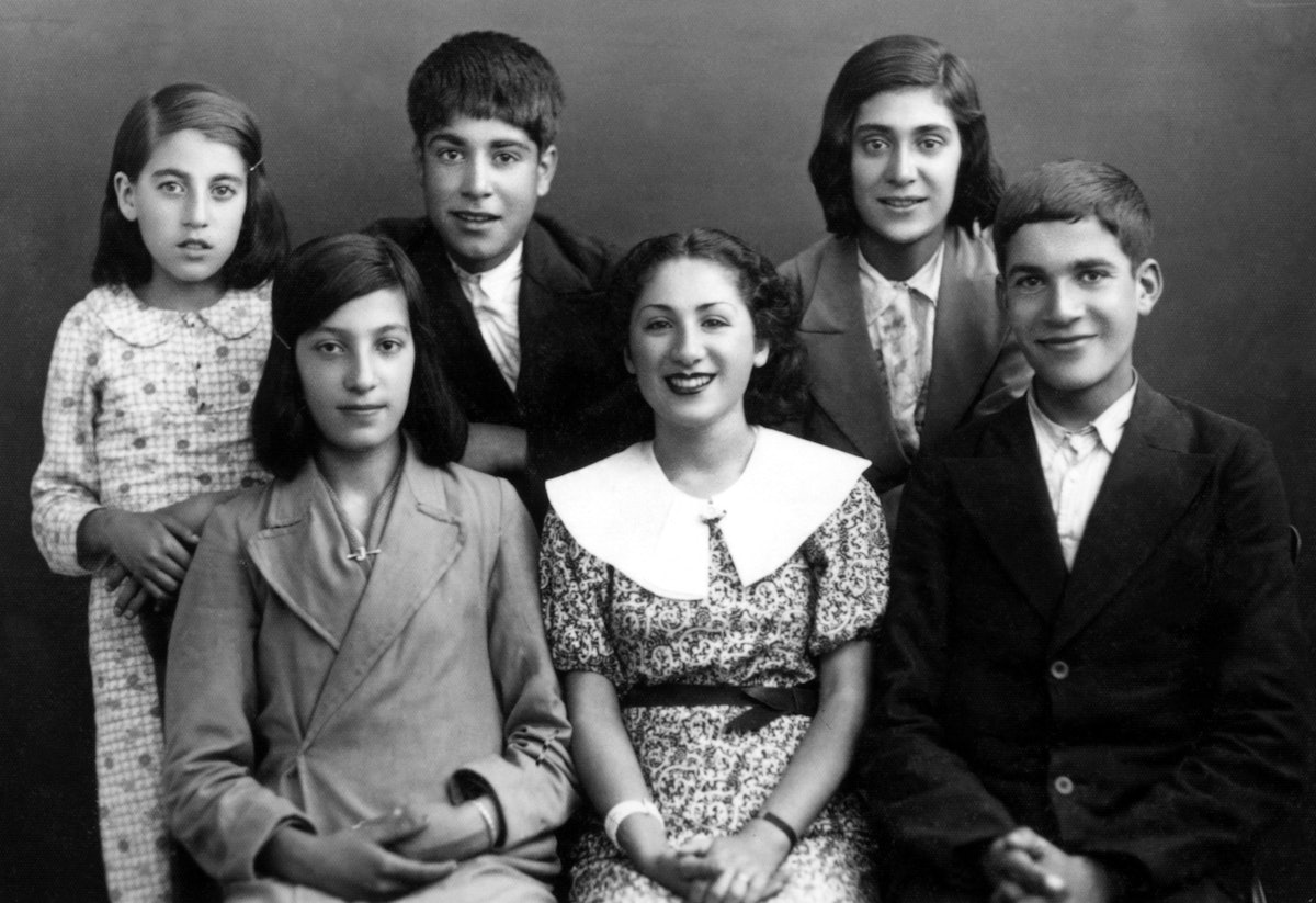 Gloria Faizi (center) with students of her Baha'i class in Najafabad, Iran, early 1940s.