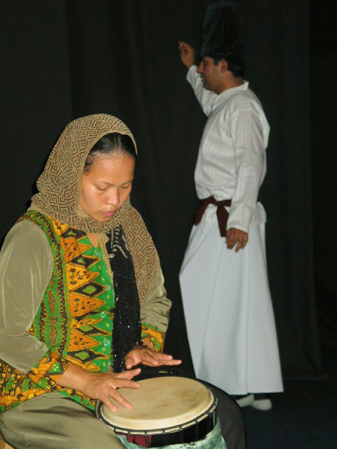 A scene from "Quest of the Spirit"... (left to right) Corinne Padilla, Philippines, and Nemat Hossieny, India.