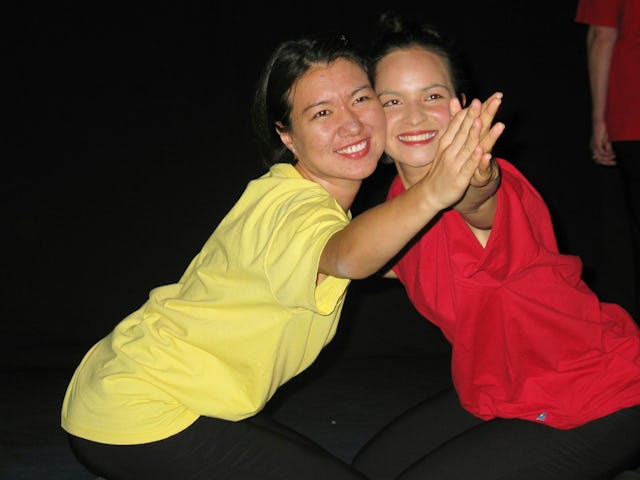 A dance from a performance of "Quest of the Spirit." Tahmina Kakenova (left), Kazakhstan, and Penina Smith, Papua New Guinea. Photo by Kevin McLoughlin.