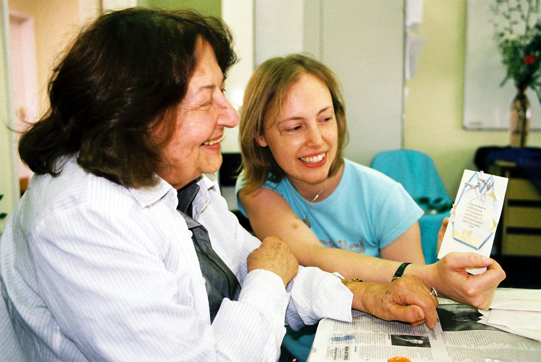 Tutor Sarah Clive (right) teaches Nirvana Farhoumand craft skills in a course on using the arts in Baha'i community life.