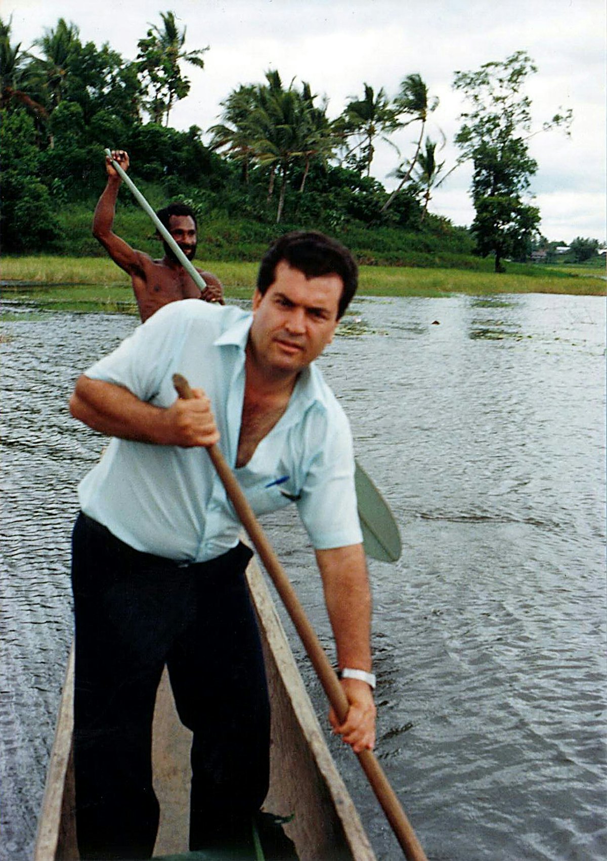 Sirus Naraqi spent much of his free time visiting remote areas of Papua New Guinea, providing medical treatment and giving advice to Baha'i communities.