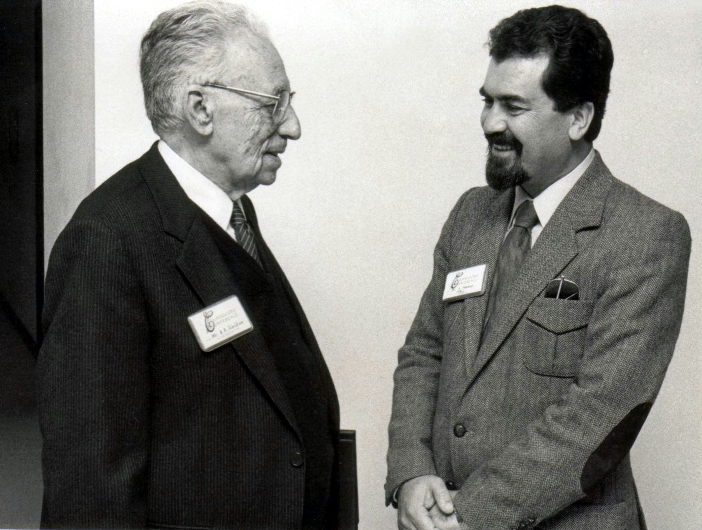 Hand of the Cause Ali-Akbar Furutan (left) with Sirus Naraqi at the Baha'i World Centre, Haifa, Israel.