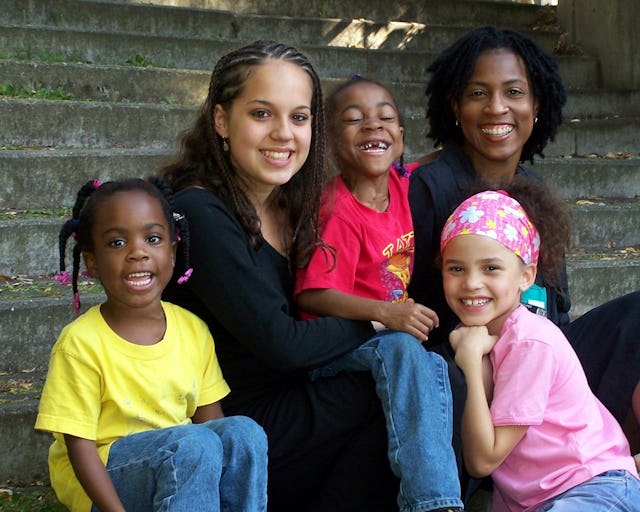 Roya Yazhari (second from left) and fellow soprano Katrina Davis (right) with Jada Davis (left), Jasmine Davis (center), and Sydney Ewing-Roush (front).