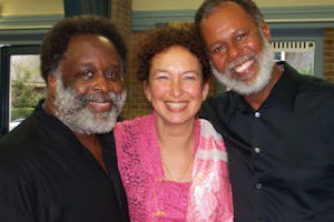 Choir members Walter Heath (left) and Ed Peace with Marianne Kemmere, who was the MC for the concerts in Rotterdam and Amsterdam.