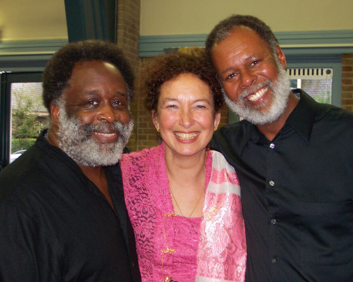 Choir members Walter Heath (left) and Ed Peace with Marianne Kemmere, who was the MC for the concerts in Rotterdam and Amsterdam.