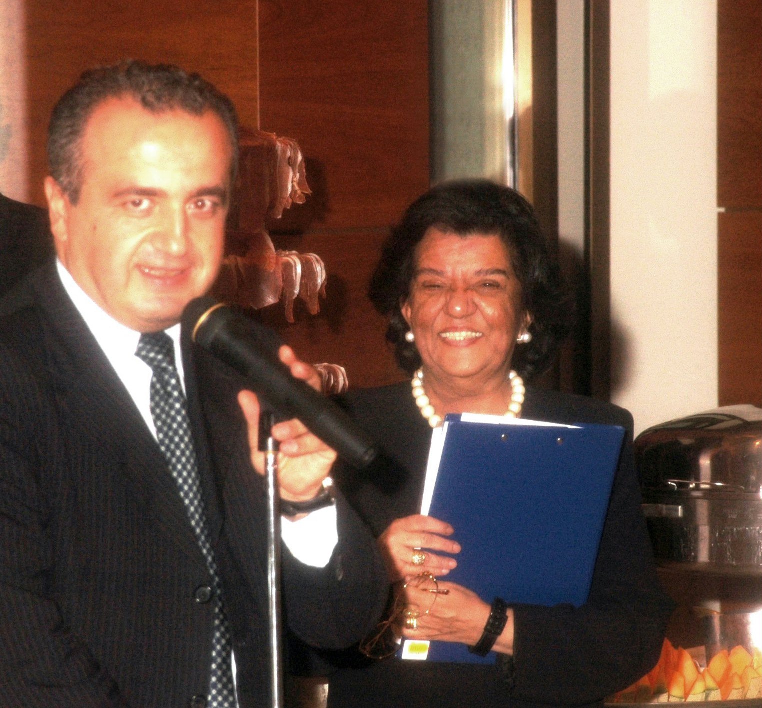San Marino's secretary of state for industry, Claudio Felici (left), with the secretary of the Spiritual Assembly of the Baha'is of San Marino, Ghitty Payman.