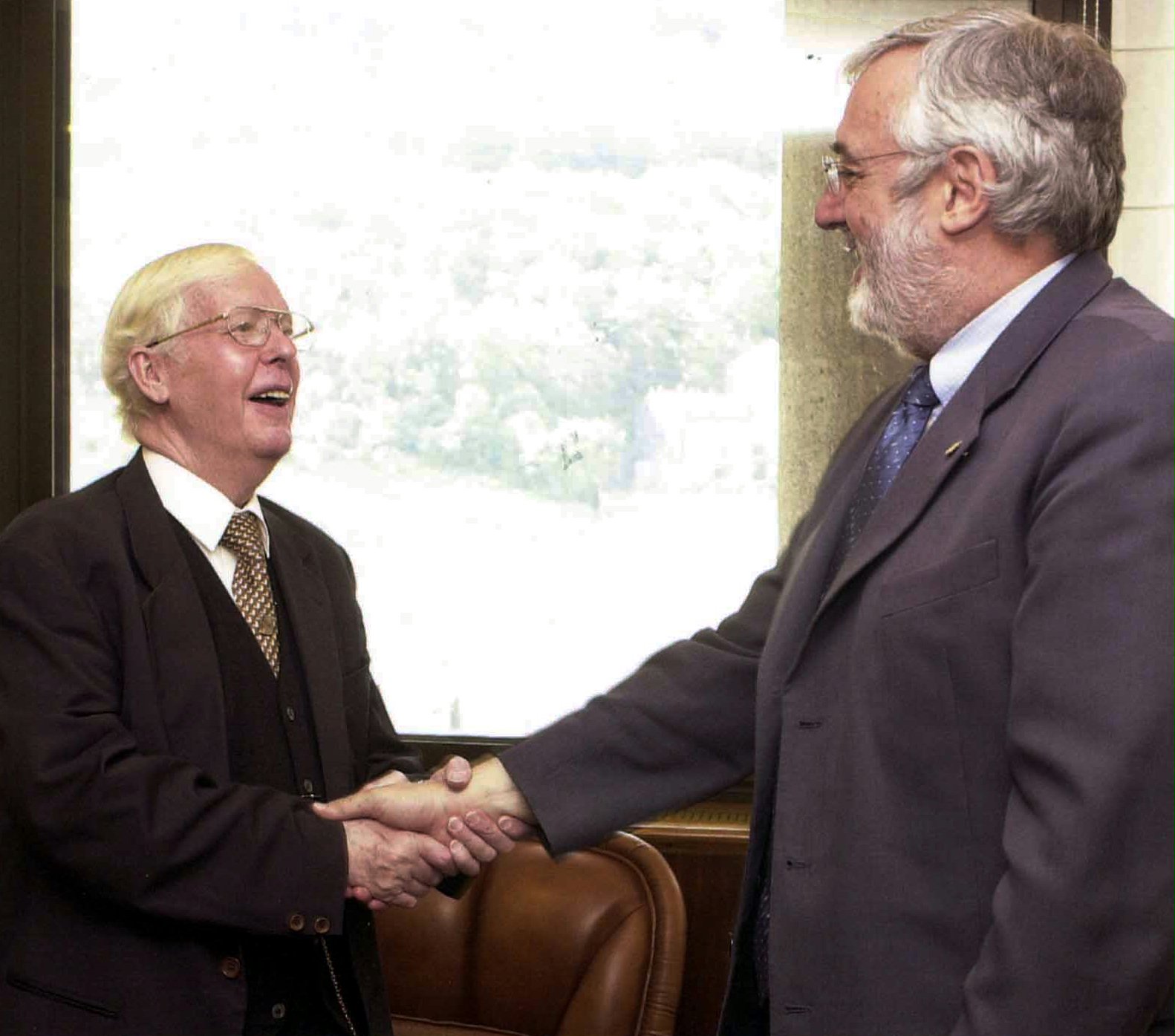 William Danjon (left) meets the Prime Minister of Andorra, Marc Forne Molne, at a reception for Baha'i representatives before the anniversary celebrations.