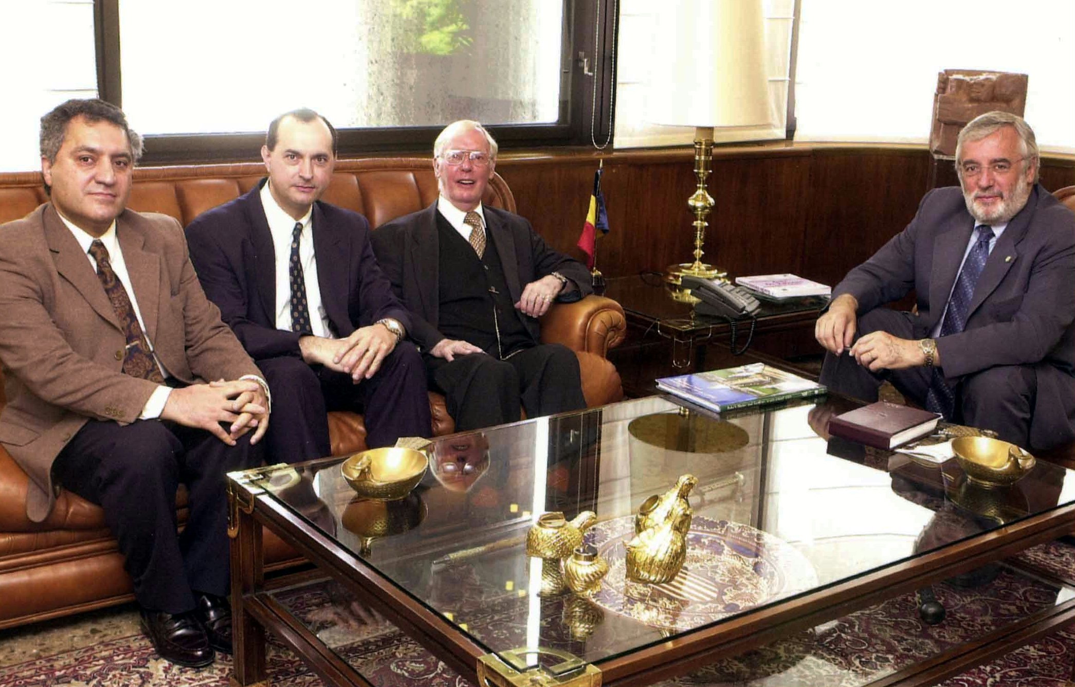 Andorra Prime Minister Marc Forne Molne (right) receives a delegation from the Baha'i community of Andorra: (left to right) Badi Daemi, Antonio Gil, William Danjon.