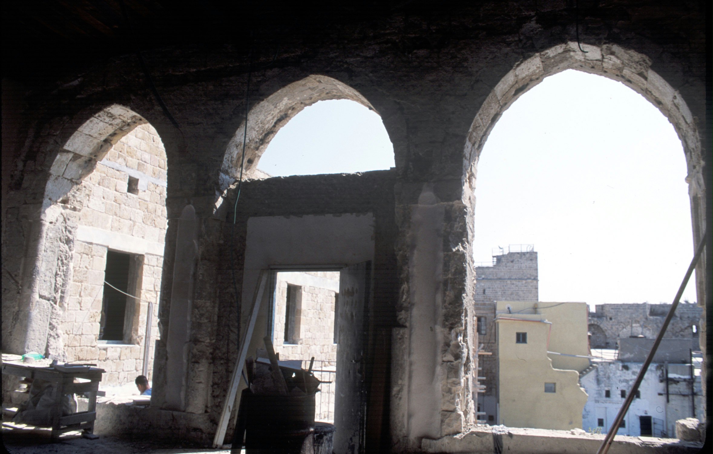 The rear wall of the floor containing Baha'u'llah's cell during restoration work. (2003)