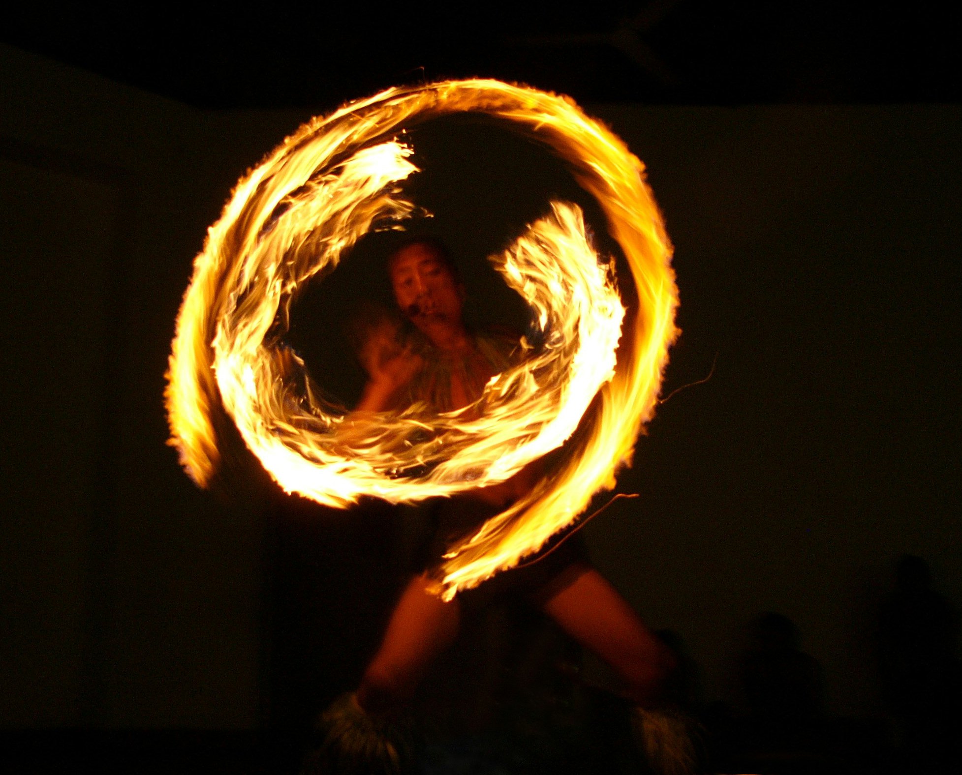 Award-winning fire dancer, Hogan Toomalatai, performing at the Baha'i jubilee festivities in Samoa.