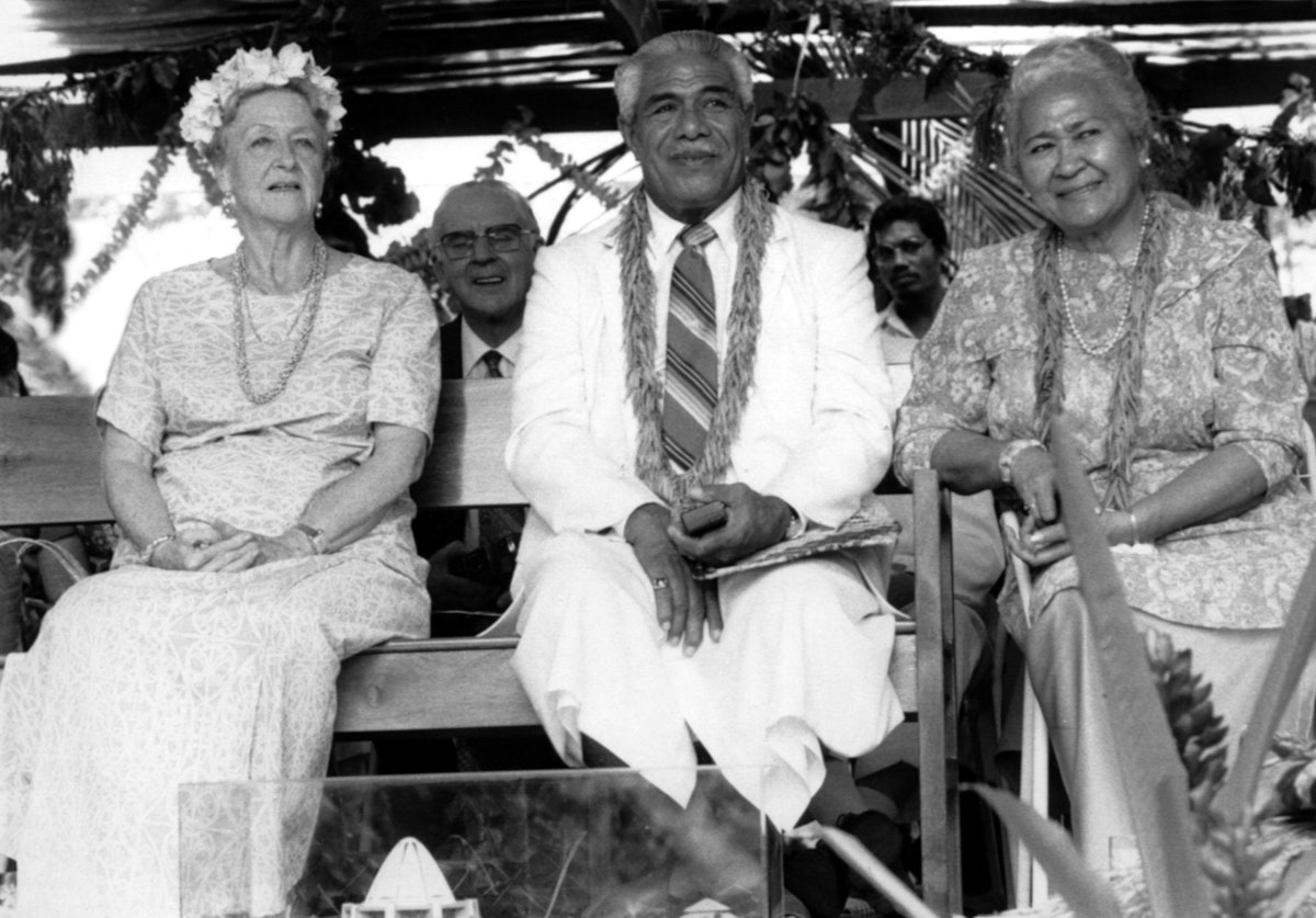 Honored guests at the opening of the Baha'i Temple in Samoa in 1984: (left to right) Madame Ruhiyyih Rabbani and, slightly behind, Mr. Collis Featherstone, both Hands of the Cause of God. His Highness Susuga Malietoa Tanumafili II is seated at center next to his wife, Masiofo Lili Tuni Malietoa.
