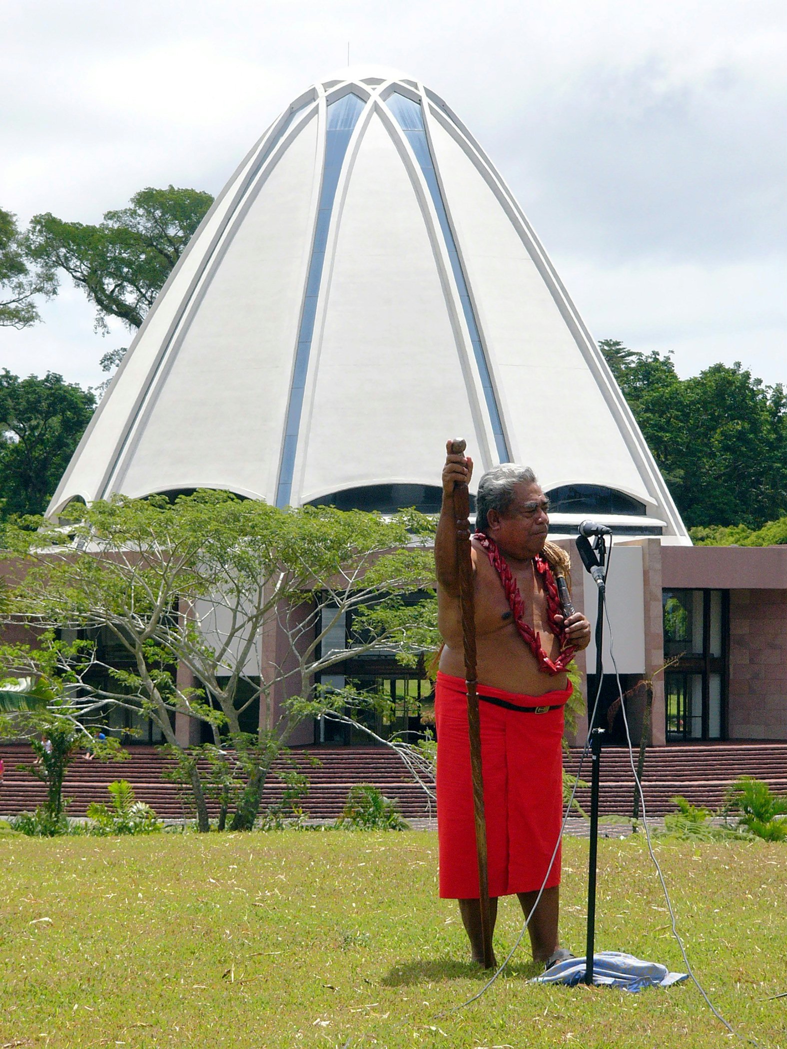 A member of the National Spiritual Assembly of the Baha'is of Samoa, Mulipola Ale, speaking at the 50th jubilee of the Samoan Baha'i community and the 20th anniversary of the Baha'i House of Worship in Samoa.