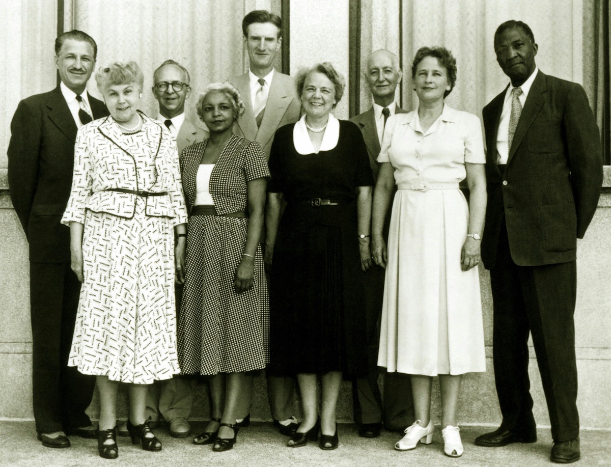 From 1946-53 Elsie Austin was a member of the National Spiritual Assembly of the Baha'is of the United States. From left to right: H. Borrah Kavelin, Mamie Seto, W. Kenneth Christian, Elsie Austin, Paul Haney, Edna True, Horace Holley, Dorothy Baker, Matthew Bullock. April 1953.