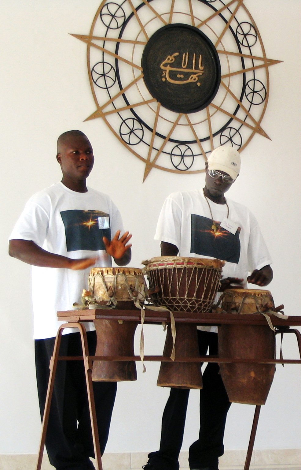 Drumming was a feature of the festivities marking the opening of a new Baha'i center in The Gambia and the 50th anniversary of the arrival of the Faith in the country. (Left to right) Bakary Bojang and Karamu Badjie, both of The Gambia.