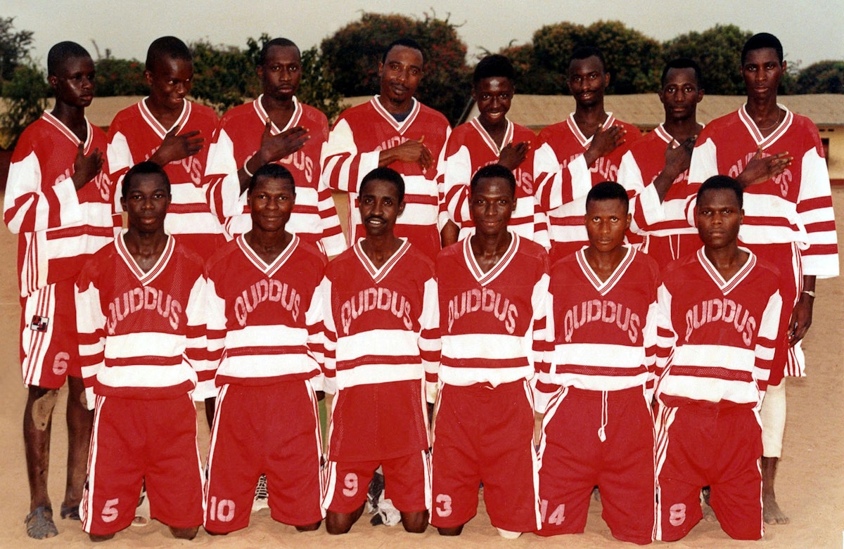 Members of the Quddus football team, organized by the national youth committee of the Baha'is of The Gambia. 1997.